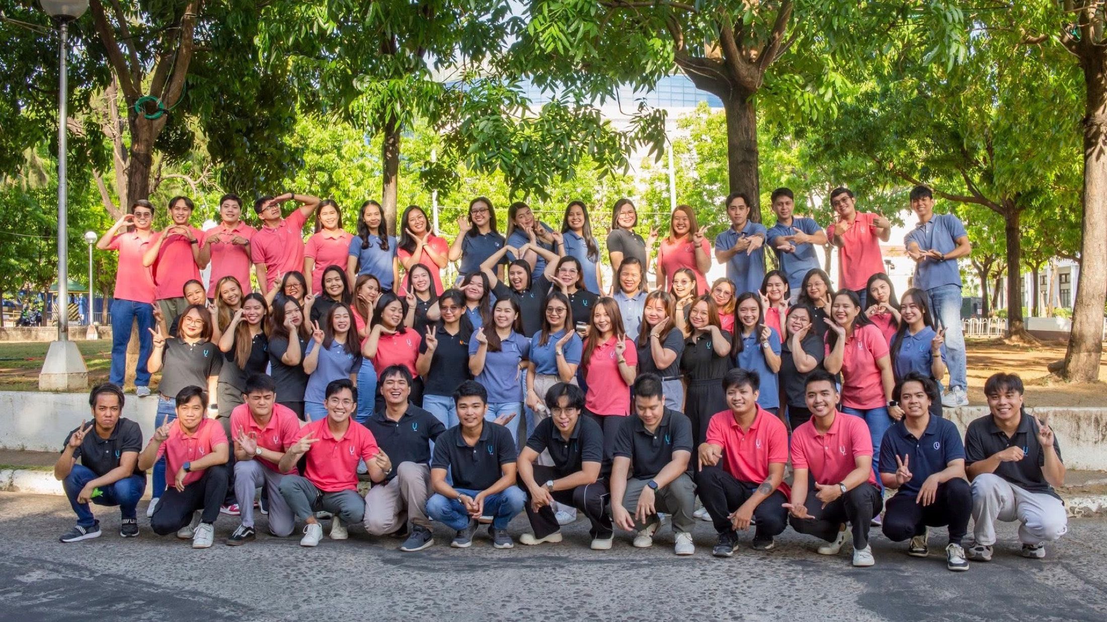 The full Yoonet team posing together outdoors in Balanga City